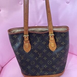 Louis Vuitton Monogram small bucket in Dark Brown and Tan